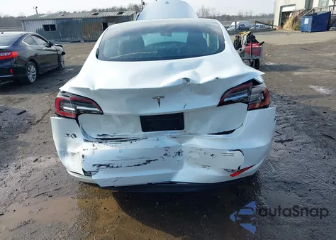 2021 Tesla Model 3 Standard Range Plus Rear-Wheel Drive from USA, damaged, VIN 5YJ3E1EA5MF850574